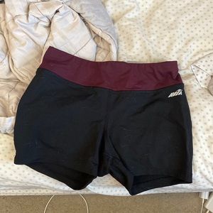 Black spandex shorts with Maroon strip